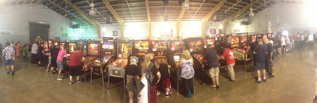 A panorama of one of the rows of playable pinball machines at the 2014 Pin-a-Go-Go in Dixon, California.